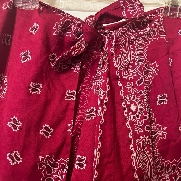 Red bandanna wrap style cover-up or skirt ties in front comes to a draping point - Picture 4 of 7